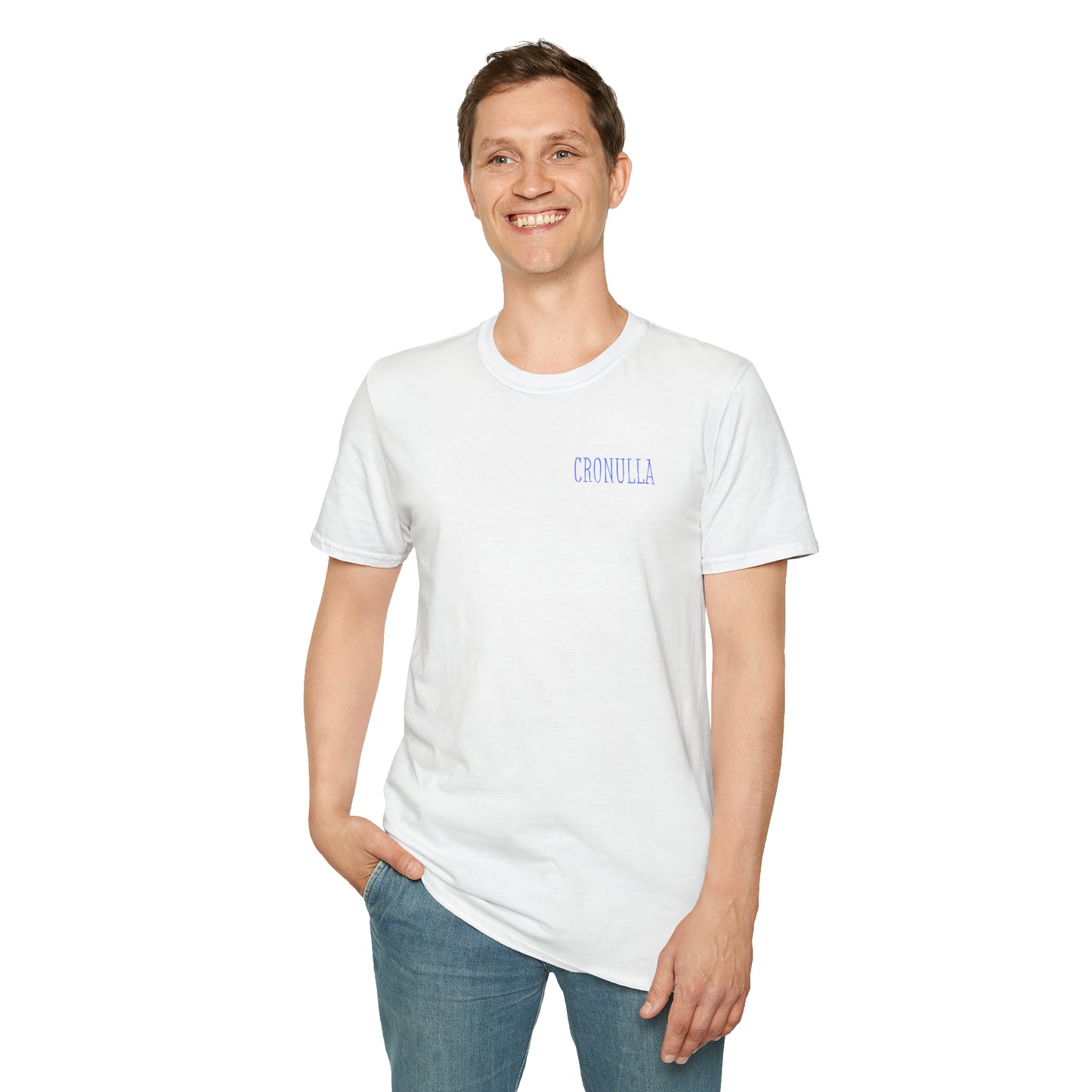 Standing male model wearing white Cronulla Sunrise 'pocket design' photo t-shirt. Front of design features the word "Cronulla" in blue printed in the left front pocket area.