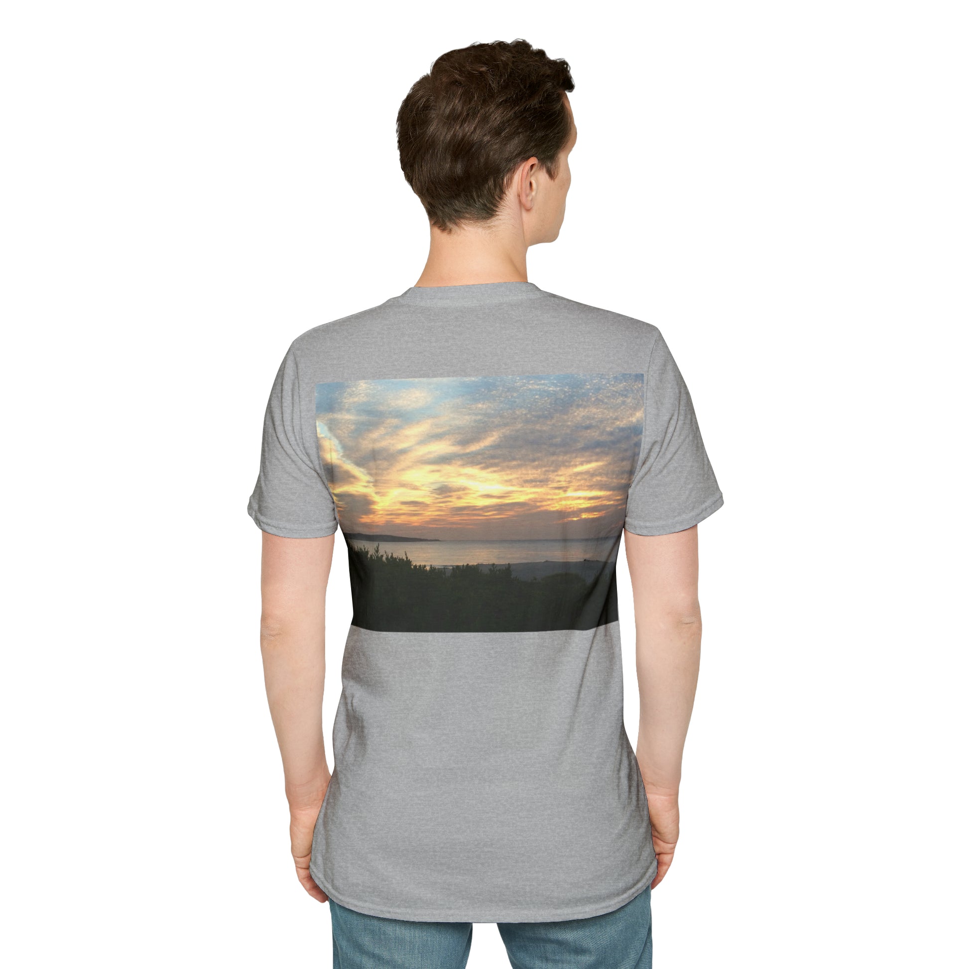 Standing male model wearing Cronulla Sunrise 'Pocket design' photo t shirt. Back of design features a photograph of the sun rising over Cronulla Beach through clouds. Grey t-shirt.